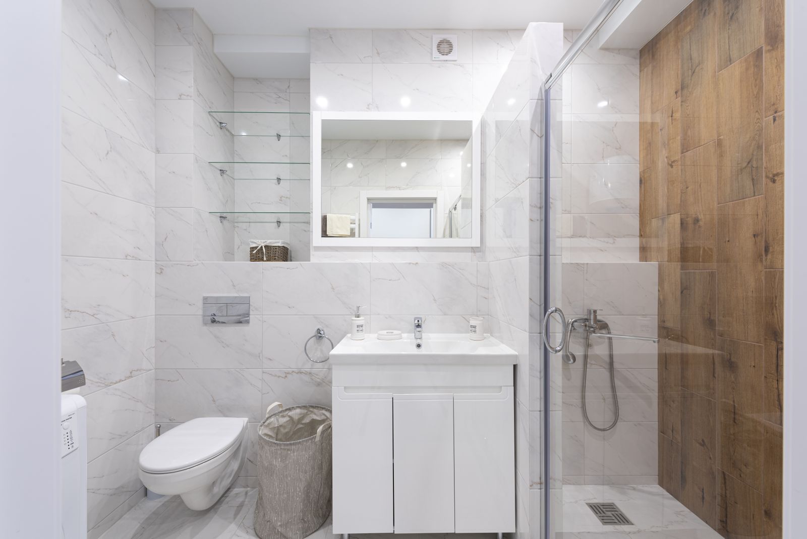 Primary ensuite. Double vanity, a real wet zone, and storage that swallows the clutter.