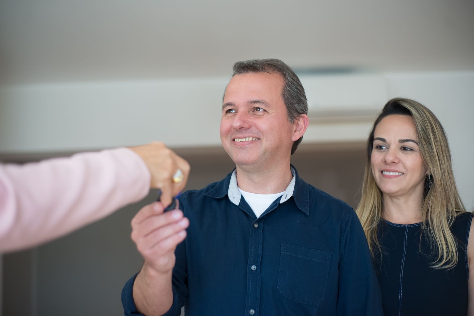 Denver homeowners at home after a bathroom remodel.